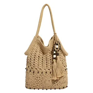 Bohemian crochet tote bag with woven hollow patterns and tassel wood bead accents