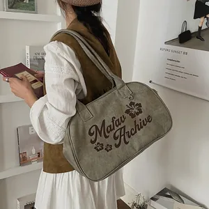 Vintage khaki canvas shoulder bag with floral print and Mafav Archive lettering