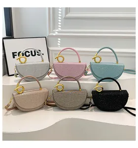 Detailed display of crescent-shaped sequin handbags in six colors with metal handles