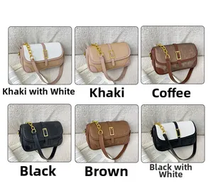 Detail view of stylish striped shoulder bags in various colors with gold chain straps