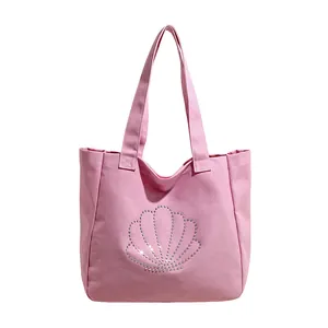Pink canvas tote bag with sparkling rhinestone shell pattern for elegant women
