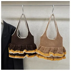 Detail of hand-knitted tote bags with layered ruffles and vibrant contrast stitching