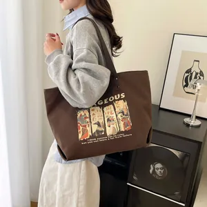 Brown Anubis tote bag with Egyptian print and leather straps for casual wear