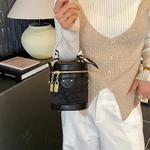 New Chinese style black bucket bag with floral jacquard and silk scarf wrapped handle