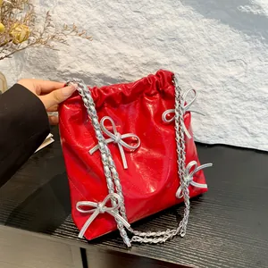 Borsa Secchiello da Donna con Fiocco Trapuntata in Pelle PU Tracolla a Catena Coulisse Borsa a Mano Stile Dolce