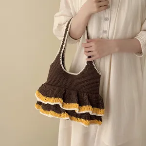 Chic brown crochet tote bag with yellow ruffled edges and large capacity for daily use