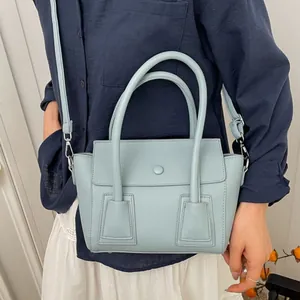 Sac à main bleu clair pour femme motif litchi avec bandoulière et poignée fixe