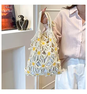 Schicke Stricktasche mit weißen Gänseblümchenmustern und sicherem Innenfutter