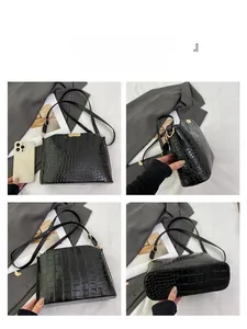 Detail shots of black crocodile texture handbag with glossy finish and gold metal hardware