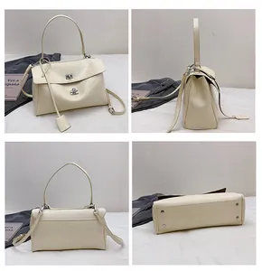 Multi-angle view of cream crocodile textured handbag with silver lock and metal bottom rivets