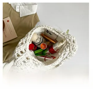 Top view of white hollow woven tote bag showing large capacity for daily essentials
