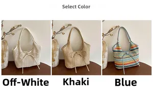Détails des sacs cabas en paille en blanc cassé, kaki et rayures arc-en-ciel bleues