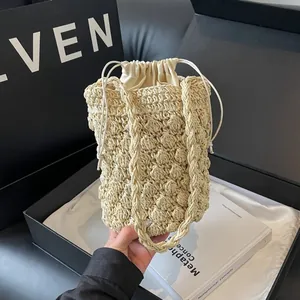 Handmade Woven Straw Bucket Bag Women Summer Beach Vacation Drawstring Shoulder Bag Minimalist Style Cream White Khaki