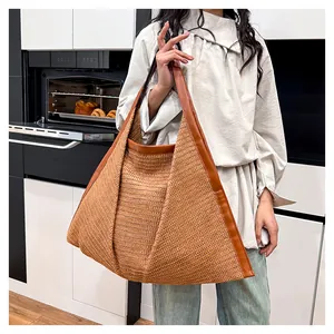 Macro detail of large woven tote bag featuring brown leopard texture and leather trim