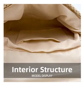 Detailed close-up of the beige fabric inner lining and internal pocket of the straw bag