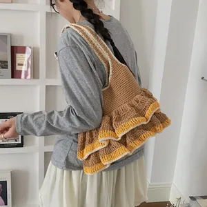 Retro oversized knit tote bag with tiered ruffles in brown and yellow crochet texture