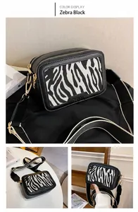Dettaglio borsa a tracolla zebrata con goffratura moda e ampia tracolla in tessuto