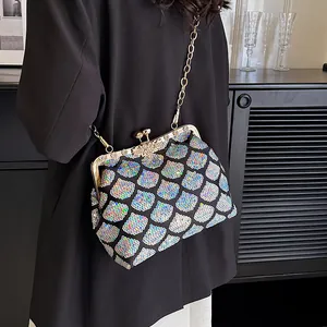 Sac coquille à paillettes écailles de sirène avec cadre doré et bandoulière chaîne