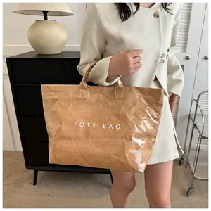 Detail of vintage Tyvek tote bag with waterproof coating and TOTE BAG lettering