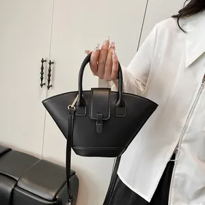 Retro fan-shaped black faux leather handbag with detachable strap and top handle design