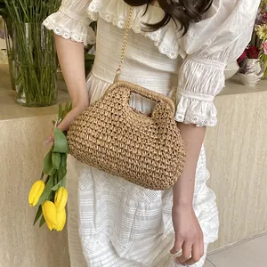 Camel woven straw crossbody cloud bag with elegant gold chain for beach vacation style