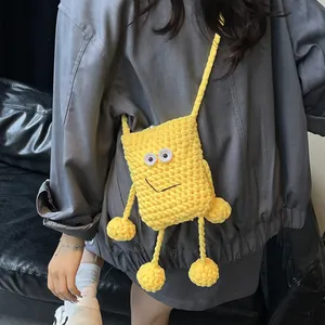 Cute yellow knit crossbody bag with a funny face design for women summer fashion
