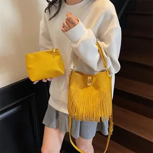Maillard fringe bucket bag set in bright yellow suede with matching inner pouch