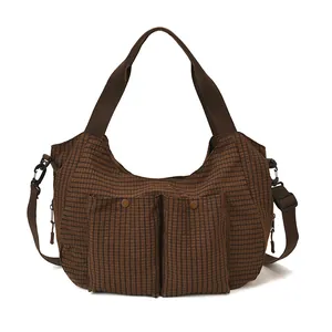 Bolso tote de lona a cuadros marrones con bolsillos dobles y correas ajustables