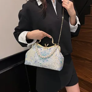 New Chinese shell bag with floral weave, pearl handle and elegant metal chain strap