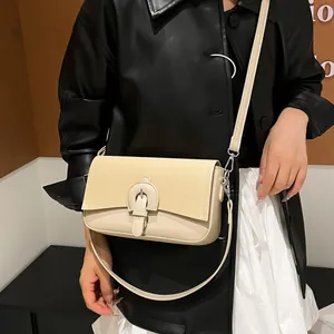 Sac bandoulière beige chic avec empiècement en tissu texturé et détails en cuir femme
