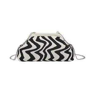 Black and white wavy knitted shell bag with silver chain strap for women fashion