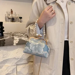 New Chinese shell handbag with pearl handle and flower jacquard fabric in blue