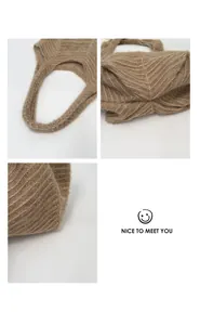 Detailed macro view of brown herringbone knit texture and plush material on tote bag