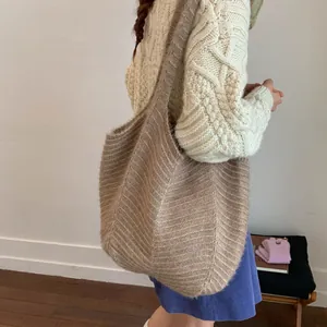 Chic beige knitted tote bag with retro stripe texture for autumn and winter outfits