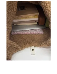 Detailed interior of leopard print sherpa tote bag showing large capacity for daily items