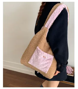 Detail of plush leopard print tote bag featuring a pink pocket with Yes Honey label