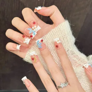 Cute ladybug and 3D floral press-on nails with blue butterfly and French tip design
