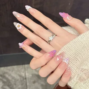 Pink and purple gradient almond press-on nails with 3D flowers and pearls
