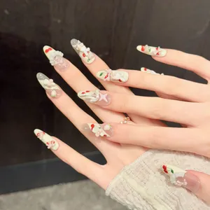 Faux ongles faits main amande avec charmes de lapin 3D, cerises et noeuds