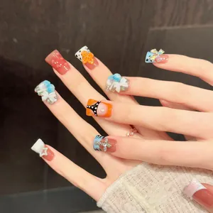 Handmade press-on nails with 3D resin bows and stars in pink and blue dopamine style