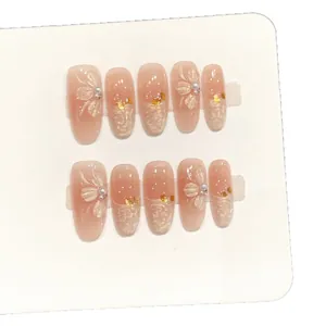 Handmade cream camellia press-on nails with 3D flowers, pearls and gold foil accents