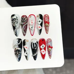 Handmade stiletto press-on nails with poker ace and mask design in red black silver