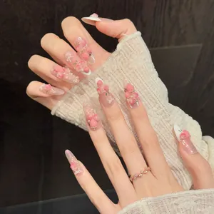 Handmade strawberry and rose press-on nails with 3D pearls and white bow accents