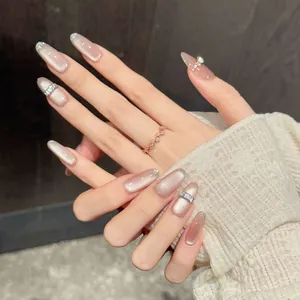 Unghie Finte Artigianali Rosa Nude Champagne Cat Eye Con Strass Stile Francese Lusso Decorative Unghie Riutilizzabili Per Donna