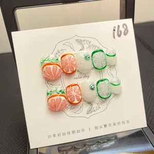 Uñas postizas 3D con relieve de pomelo y lima para un estilo fresco de verano