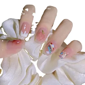 Faux ongles faits main avec motifs de pêche et arc-en-ciel au style coréen mignon