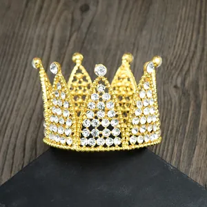 Elegant gold mini crown with sparkling rhinestones for cake topper or bridal hair jewelry
