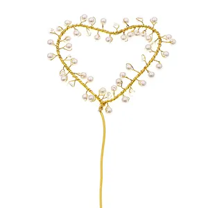 Golden heart cake topper with elegant pearls and beads for birthday dessert decoration