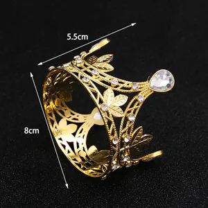 Detailed view of a gold plated crown with rhinestones, 5.5cm high and 8cm diameter