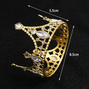 Detail of a 5.5cm tall gold alloy crown topper with sparkling marquise rhinestones